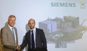 Koos-Jan van Brouwershaven, CEO HFG (l) and Andreas Barth, Head of Grid Access at Siemens (r).
