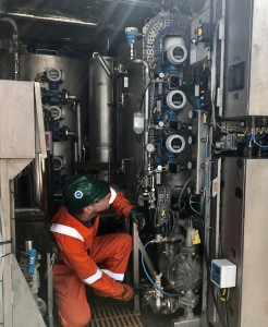 A Nature Group engineer operating one of the company’s Compact Treatment Units (CTU)