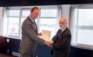 Damen CEO Mr Berkvens (left) receives a CEMT award from CEMT Chairman Mr Blakeley