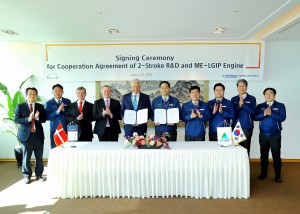 The MoU signing ceremony. From left (HHI-EMD unless stated): S.B. Cha, Head of MAN Diesel & Turbo, Korea Marketing Diesel; C.L. Lyu, Senior Vice President, Sales; Tommy Rasmussen, Head of MAN Diesel & Turbo, Korea; Bjarne Foldager, Vice President Sales & Promotion, MAN Diesel & Turbo, Two-Stroke Business; Klaus Engberg, Senior Vice President, Licensing, MAN Diesel & Turbo; K.D. Chang, Senior Executive Vice President, Chief Operating Officer; K.D. Lee, Executive Vice President, Sales and Design; J.S. Han, Senior Vice President, Design; J.D. Yu, General Manager, Head of Two-Stroke Engine Design Department, W.S. Jeong, Deputy General Manager, Head of Marine Engine & Machinery Sales Department II.